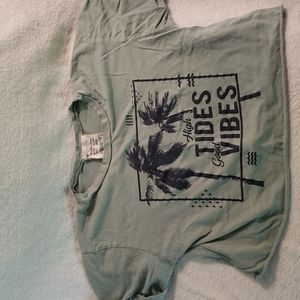 Medium made by French pastry it's green with navy blue print size medium